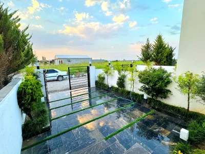 ویلا همکف نما مدرن شهرکی با سند تک برگ‌