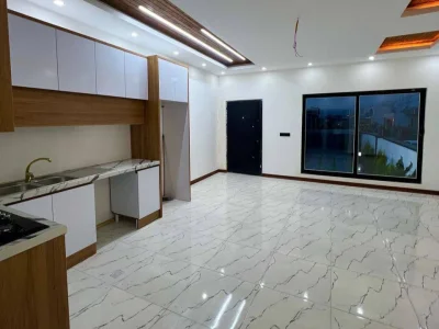 خرید ویلا همکف مدرن شهرکی سنددار در فاصله ۱۰۰ متری جاده اصلی 