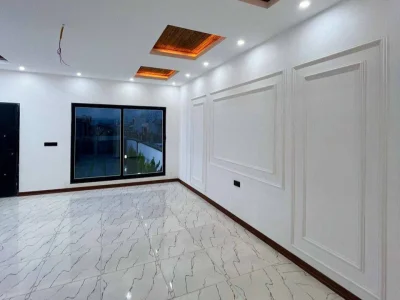 خرید ویلا همکف مدرن شهرکی سنددار در فاصله ۱۰۰ متری جاده اصلی 