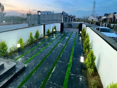 خرید ویلا همکف مدرن شهرکی سنددار در فاصله ۱۰۰ متری جاده اصلی 