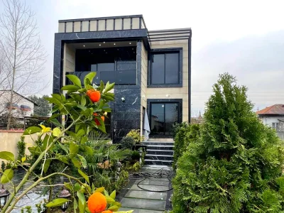 ویلا دوبلکس نما مدرن شهرکی با سند تک برگ و نزدیک جاده اصلی 